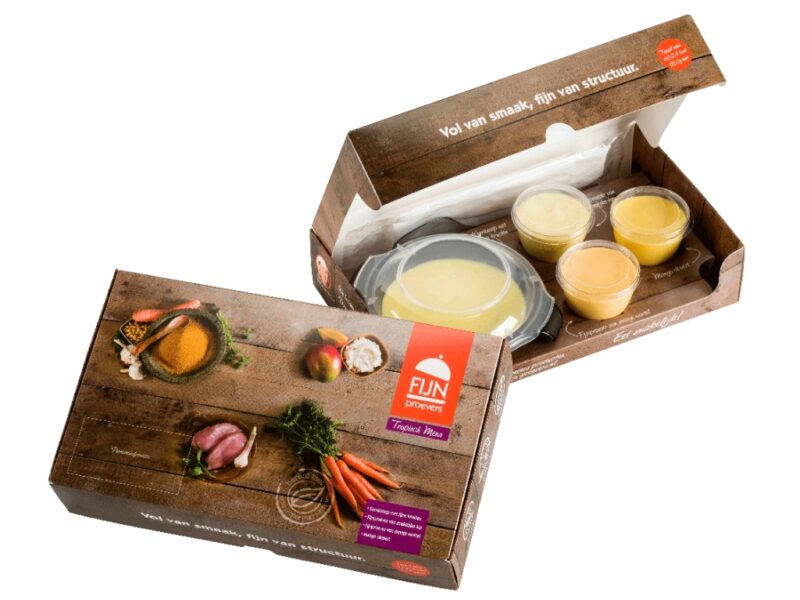 Fijnproevers Tropisch Menu: eiwitverrijkte maaltijd met kerriesoep, kip, wortel en mango dessert voor mensen met kauw- en slikproblemen.